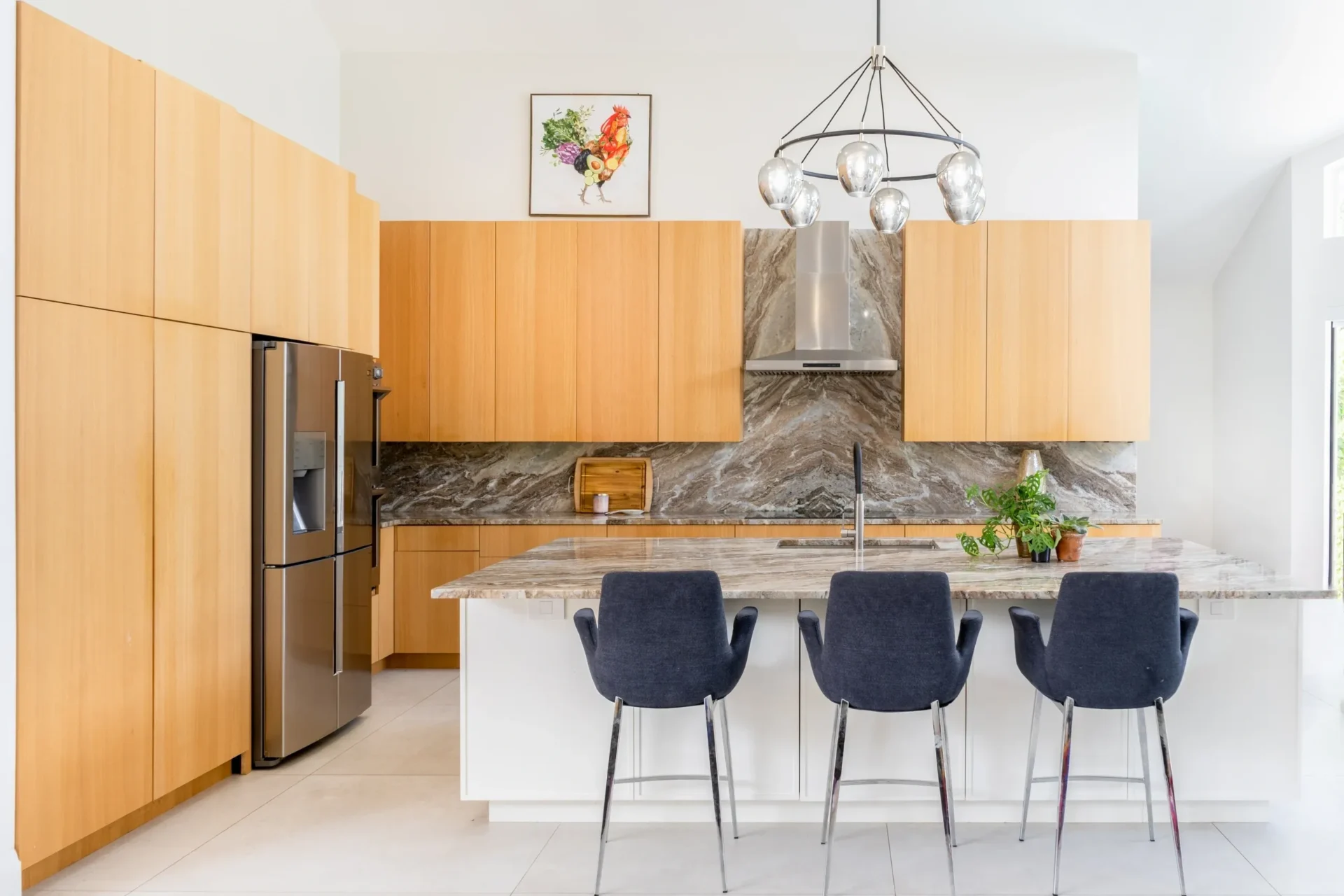 Modern kitchen with wooden cabinets and island.