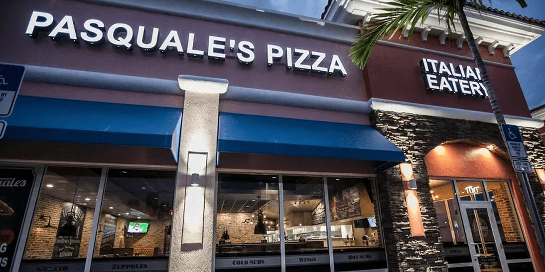 Pasquale's Pizza exterior at night.